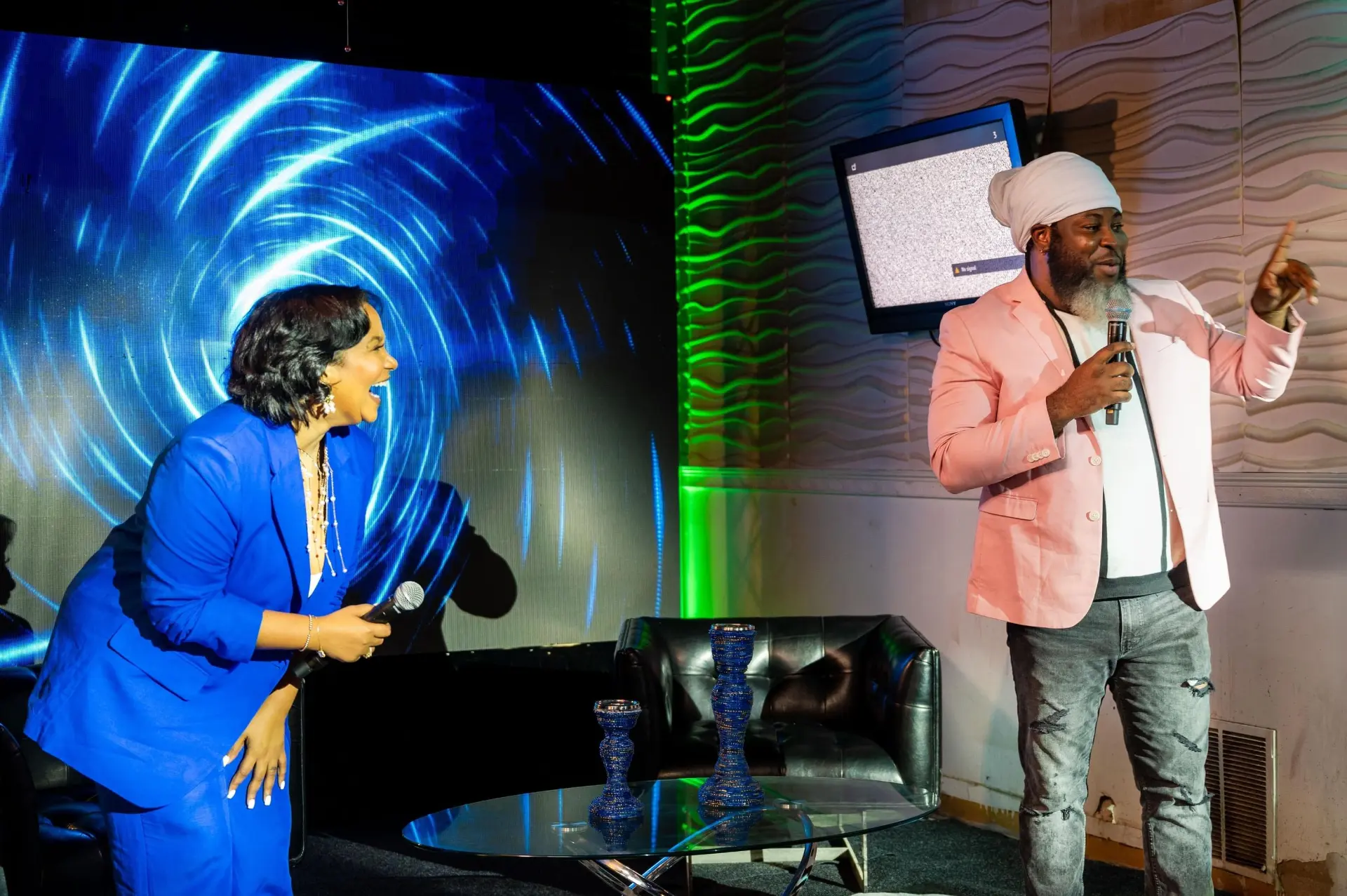 Boss Esdras speaking on stage during a 509 Biz Academy live event